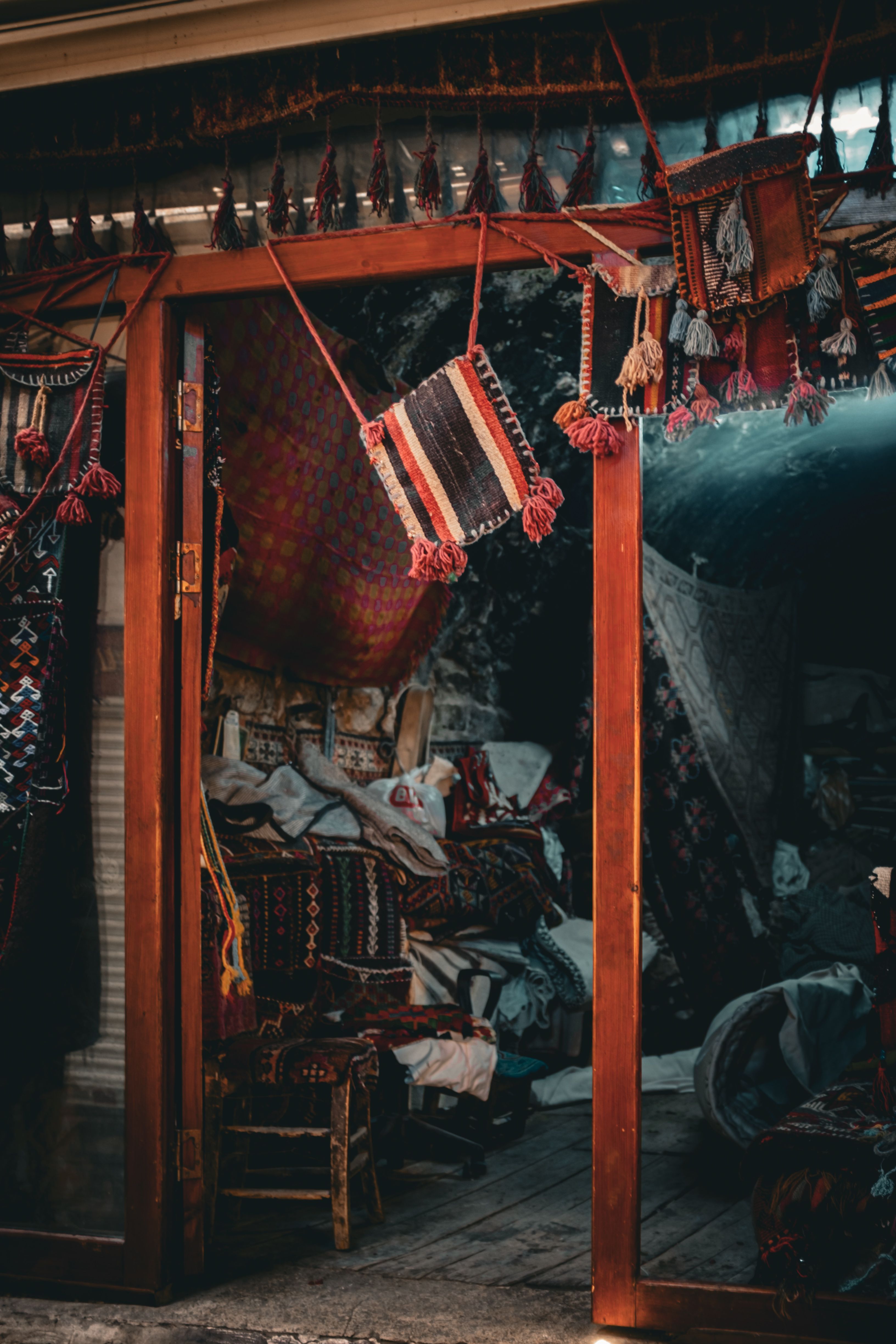 Handwoven textiles and tassels at a fabric shop